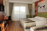 Кровать или кровати в номере Sealife Buket Resort & Beach Hotel