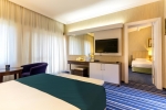 Кровать или кровати в номере Aqua Fantasy Aquapark Hotel & Spa - 24H All Inclusive