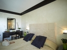 Кровать или кровати в номере Mitsis Faliraki Beach Hotel & Spa