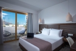 Кровать или кровати в номере Meropi Hotel & Apartments