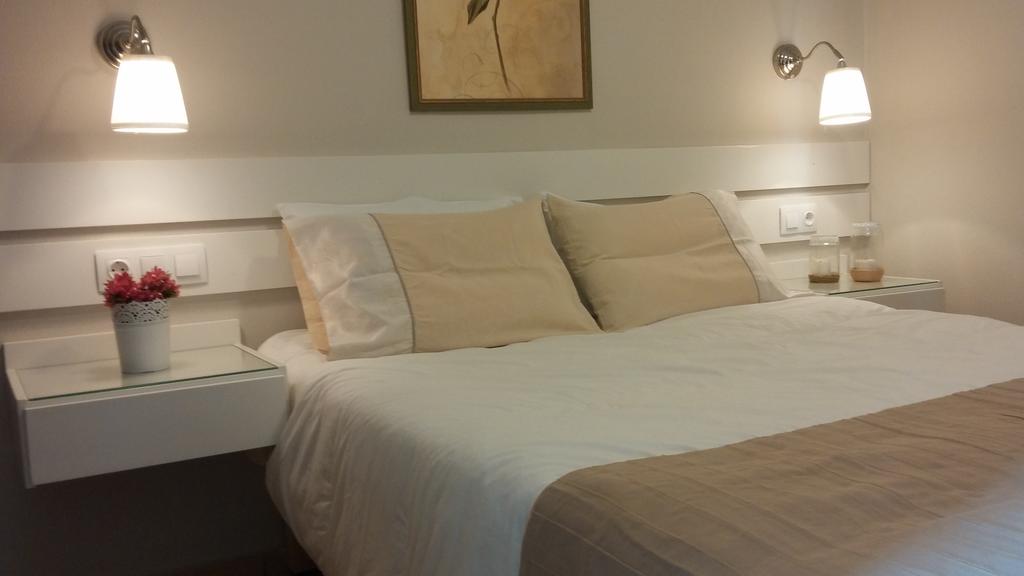 Кровать или кровати в номере Blue Sky Apartments 