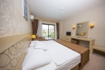 Кровать или кровати в номере Eldar Resort Hotel