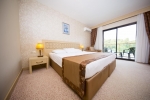 Кровать или кровати в номере Eldar Resort Hotel