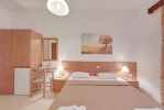 Кровать или кровати в номере Marirena Hotel