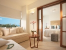 Кровать или кровати в номере Amirandes, Grecotel Exclusive Resort