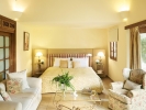 Кровать или кровати в номере Corfu Imperial, Grecotel Exclusive Resort