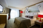Кровать или кровати в номере Q Premium Resort Hotel - Ultra All Inclusive