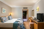 Кровать или кровати в номере Xanadu Resort Hotel
