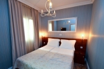 Кровать или кровати в номере Mali Hotel Porat