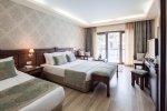Кровать или кровати в номере Club Hotel Turan Prince World - Kids Concept
