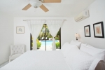 Кровать или кровати в номере Casa de Campo Resort & Villas