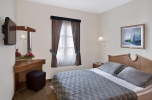 Кровать или кровати в номере Sunrise Resort Hotel