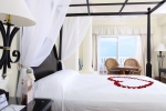 Кровать или кровати в номере Grand Bahia Principe Jamaica