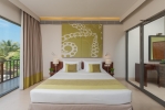 Кровать или кровати в номере Amaya Beach Passikudah