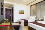 Кровать или кровати в номере Jie Jie Beach by Jetwing