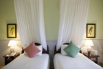 Кровать или кровати в номере La Veranda Resort Phu Quoc - MGallery by Sofitel