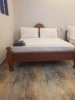 Кровать или кровати в номере La Fontana Bungalows