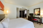 Кровать или кровати в номере Centara Kata Resort Phuket