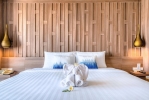 Кровать или кровати в номере Namaka Resort Kamala