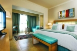 Кровать или кровати в номере Mövenpick Resort Soma Bay