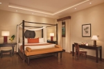 Кровать или кровати в номере Zoetry Agua Punta Cana