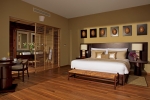Кровать или кровати в номере Zoetry Agua Punta Cana