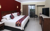 Кровать или кровати в номере Adhara Hacienda Cancun