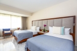 Кровать или кровати в номере Park Royal Golden Cancún