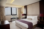 Кровать или кровати в номере Bab Al Qasr Hotel