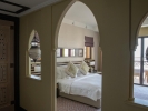 Кровать или кровати в номере Jumeirah Mina A'Salam
