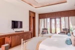 Кровать или кровати в номере Maikhao Dream Villa Resort and Spa, Centara Boutique Collection
