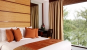 Кровать или кровати в номере Mövenpick Resort Bangtao Beach Phuket