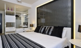 Кровать или кровати в номере Meliá South Beach