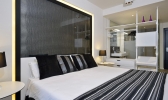 Кровать или кровати в номере Meliá South Beach