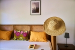 Кровать или кровати в номере Spice Island Hotel & Resort