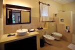 Ванная комната в Diamonds Mapenzi Beach - All Inclusive