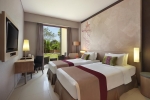 Кровать или кровати в номере Mercure Bali Nusa Dua
