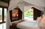 Кровать или кровати в номере Puri Wulandari - A Boutique Resort & Spa