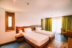 Кровать или кровати в номере Green Bay Phu Quoc Resort & Spa