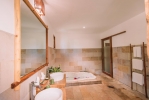 Ванная комната в Green Bay Phu Quoc Resort & Spa