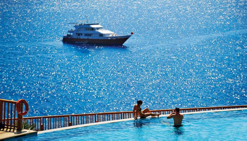 Отель Бассейн в Reef Oasis Blue Bay Resort & Spa или поблизости