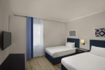 Кровать или кровати в номере IC Hotels Santai Family Resort - Kids Concept