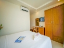 Кровать или кровати в номере Ola Phu Quoc Hotel