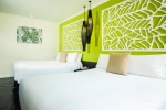 Кровать или кровати в номере Centara Karon Resort Phuket
