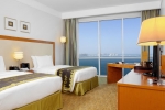 Кровать или кровати в номере Hilton Doha
