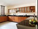 Кухня или мини-кухня в Grand Hyatt Doha Hotel & Villas 