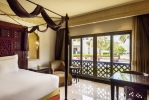Кровать или кровати в номере Sharq Village & Spa, a Ritz-Carlton Hotel