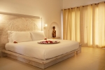Кровать или кровати в номере Gold Zanzibar Beach House & Spa