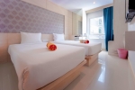 Кровать или кровати в номере Mirage Express Patong Phuket Hotel