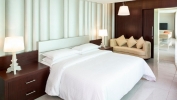 Кровать или кровати в номере Four Points by Sheraton Sharjah